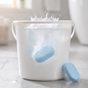 Orvell Floor Tab fizzing and dissolving in a bucket of warm water