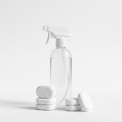 Orvell Clean Tabs cleaning tablets with white spray bottle on a plain background